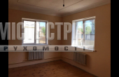 житловий цегляний  будинок